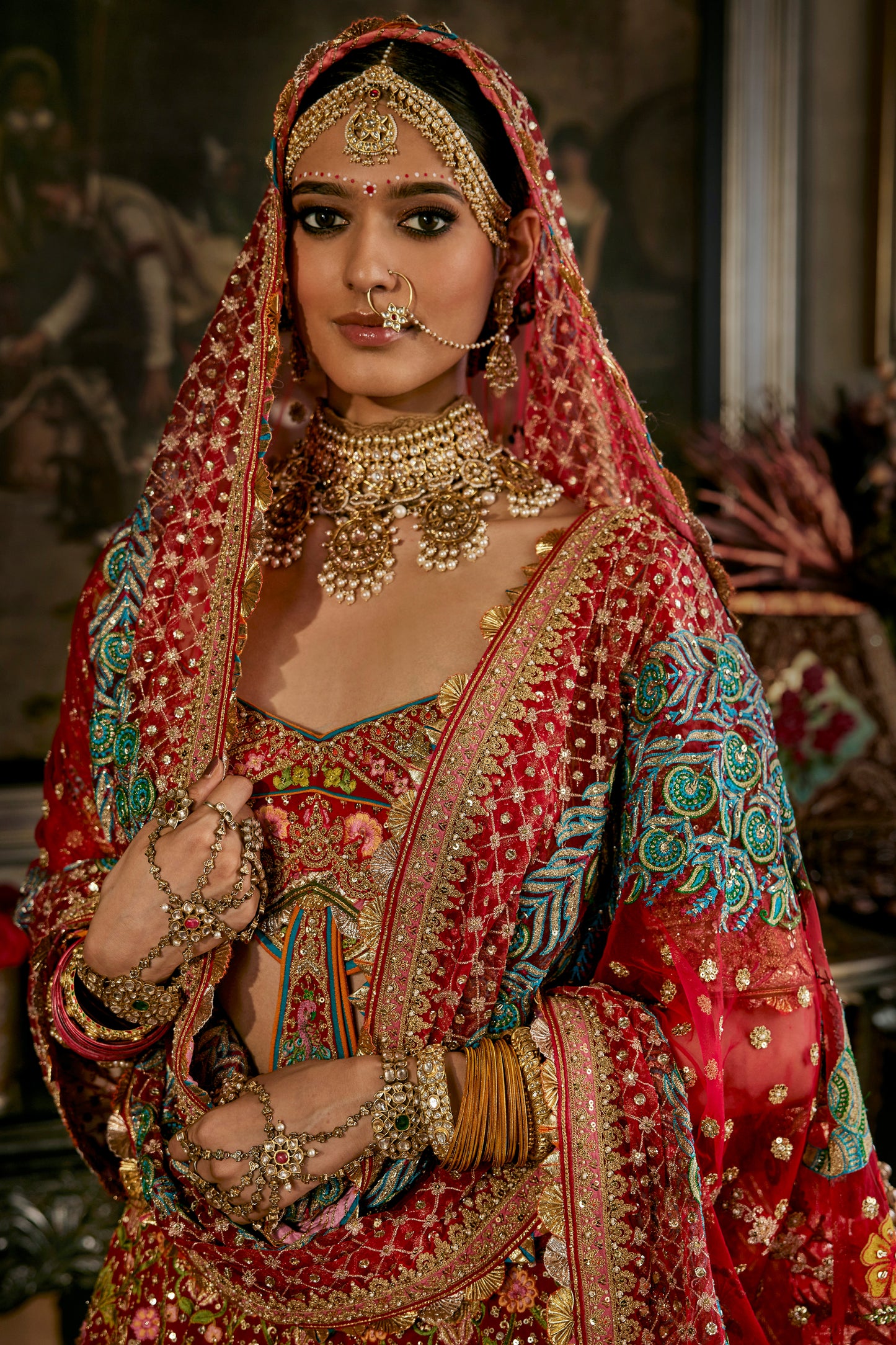 Red Ornate Gilted Frames Lehenga