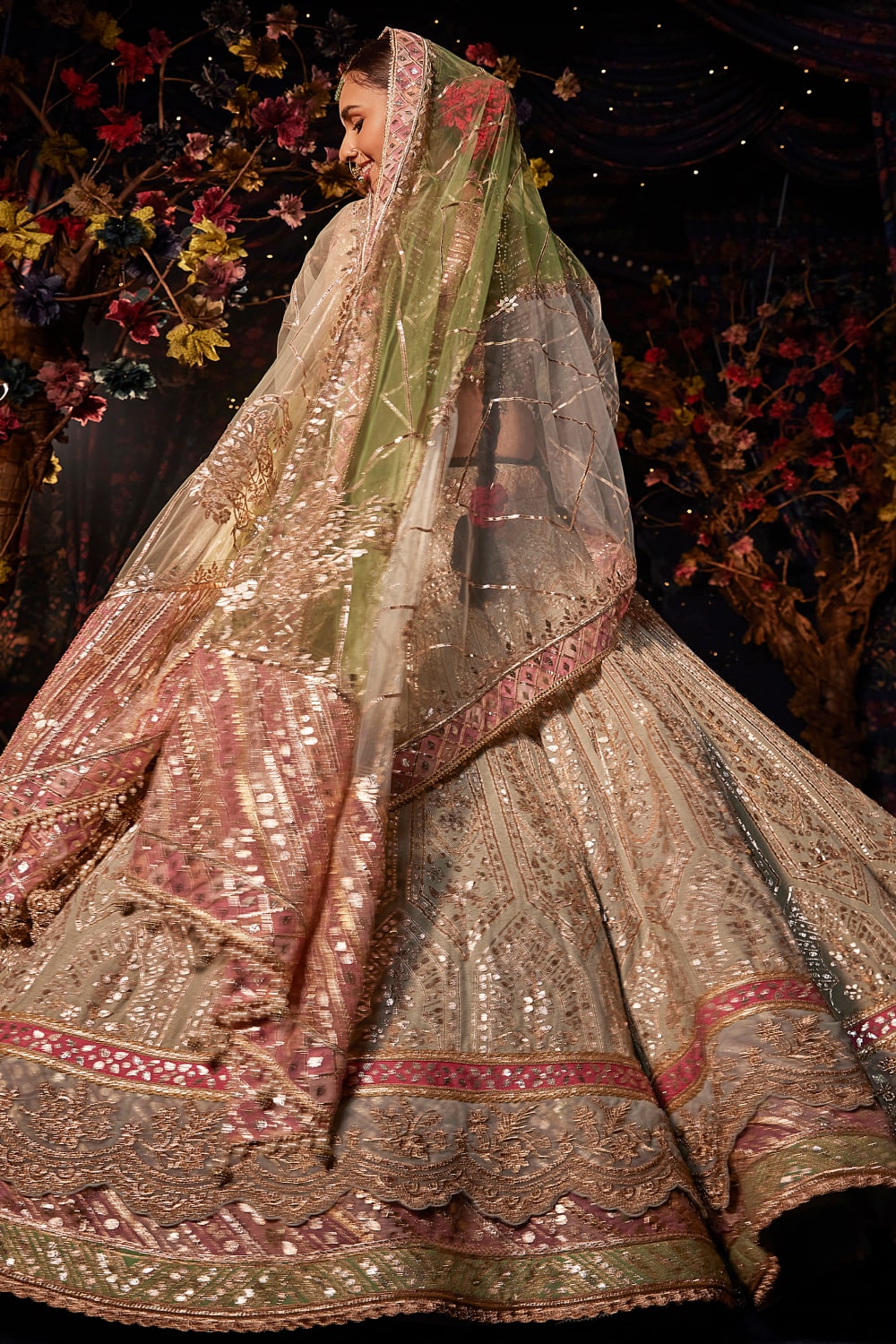 Mustard material lehenga set features intricately embroidered & stone work  net material skirt, top & dupatta